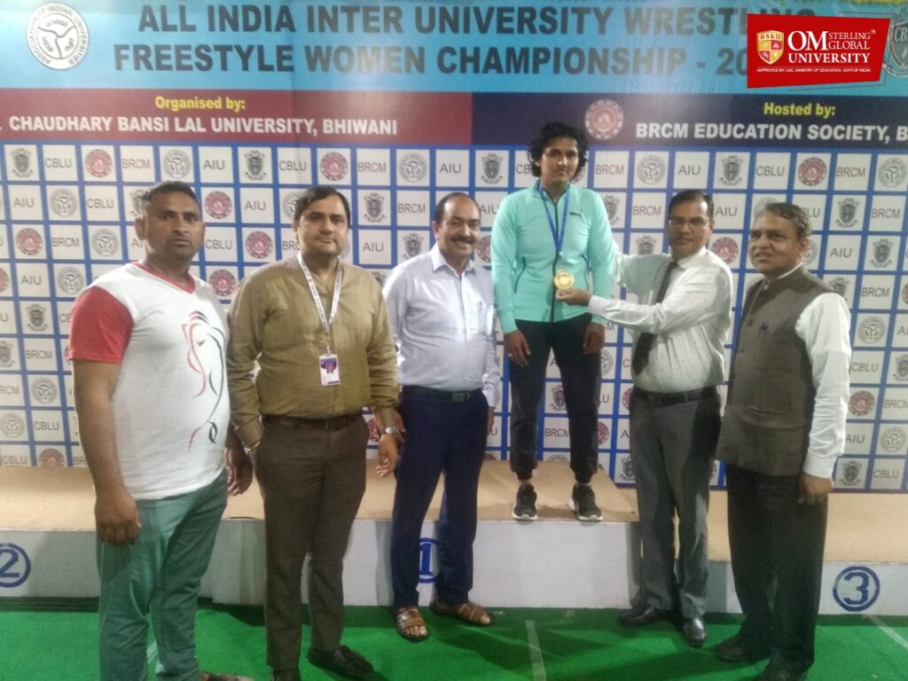 Nisha Student of Yoga and Naturopathy with Gold Medal in Inter-University Wrestling Championship